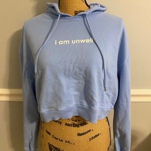 Barstool Sports Call her Daddy "I am unwell" light blue cropped hoodie